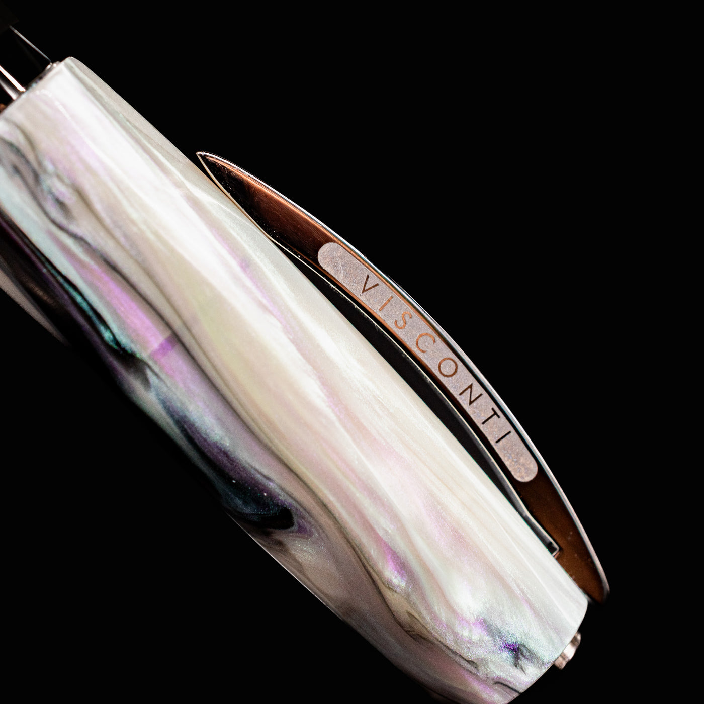 Macro shot of the Visconti Divina Abalone Serial #1 clip with engraved brand name