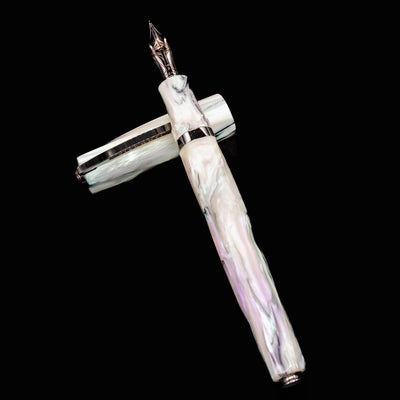 Overhead shot of Visconti Divina Abalone Serial #1 Fountain Pen with cap posted