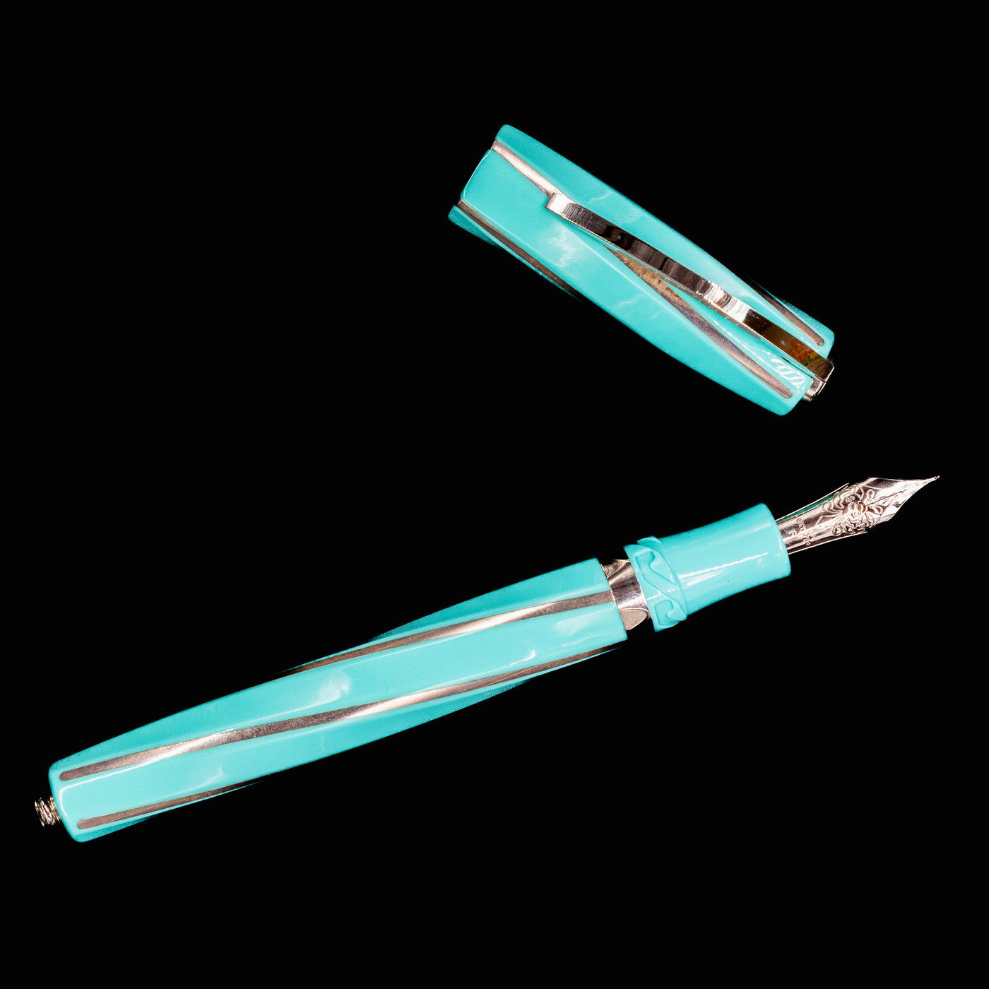 Visconti Divina Elegance Wave Fountain Pen laid flat with cap off, showing nib and silver inlay