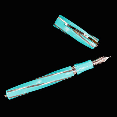 Visconti Divina Elegance Wave Fountain Pen laid flat with cap off, showing nib and silver inlay
