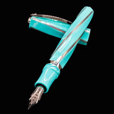 Close-up of Visconti Divina Elegance Wave Fountain Pen nib and cap