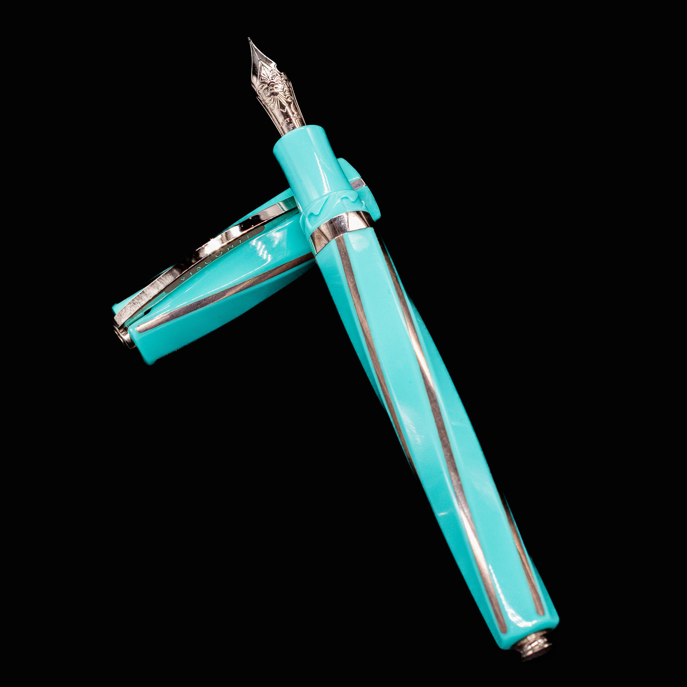 Overhead view of Visconti Divina Elegance Wave Fountain Pen with cap and body crossed