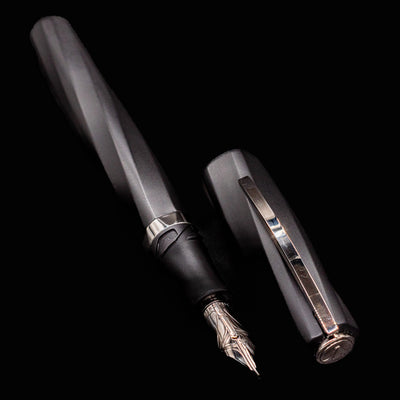 Diagonal layout of Visconti Divina Matte Black Fountain Pen with cap and polished trim accents
