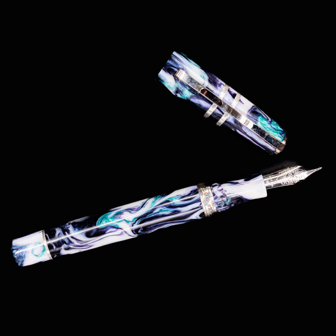 Full view of the Visconti Homo Sapiens Air Fountain Pen with blue, purple, and white swirled resin