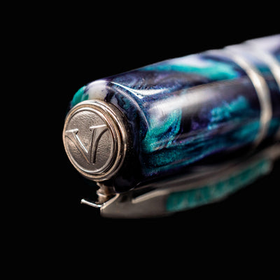 Close-up of Visconti Homo Sapiens Air fountain pen cap top with engraved V logo