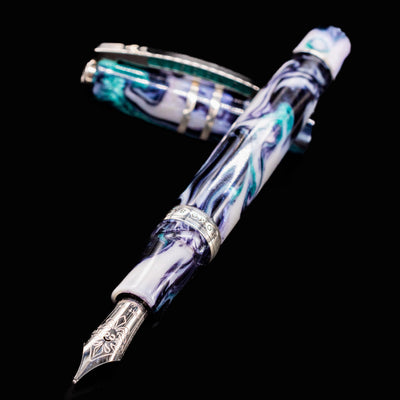 Side view of Visconti Homo Sapiens Air fountain pen with cap off, showcasing resin swirls and silver trim