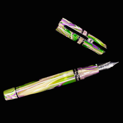Flat lay of Visconti Homo Sapiens Lotus Garden Fountain Pen with cap removed on black background