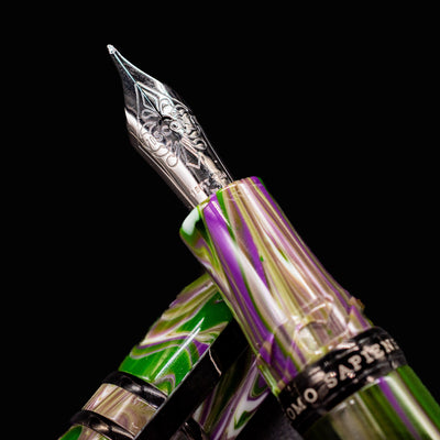 Macro shot of Visconti Homo Sapiens Lotus Garden silver nib with engraved floral detailing