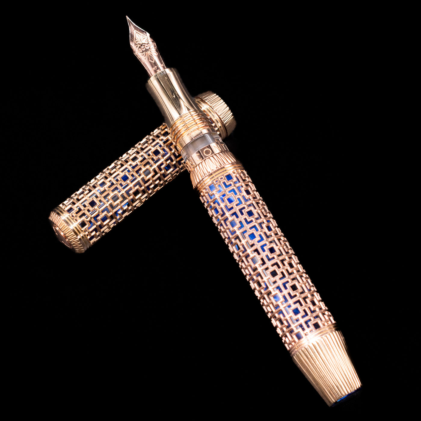 Close-up of Visconti Looking East Fountain Pen body highlighting rose gold vermeil filigree and engraved metal overlay