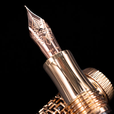 Close-up of 18k gold nib on Visconti Looking East Fountain Pen with elegant engraved detailing