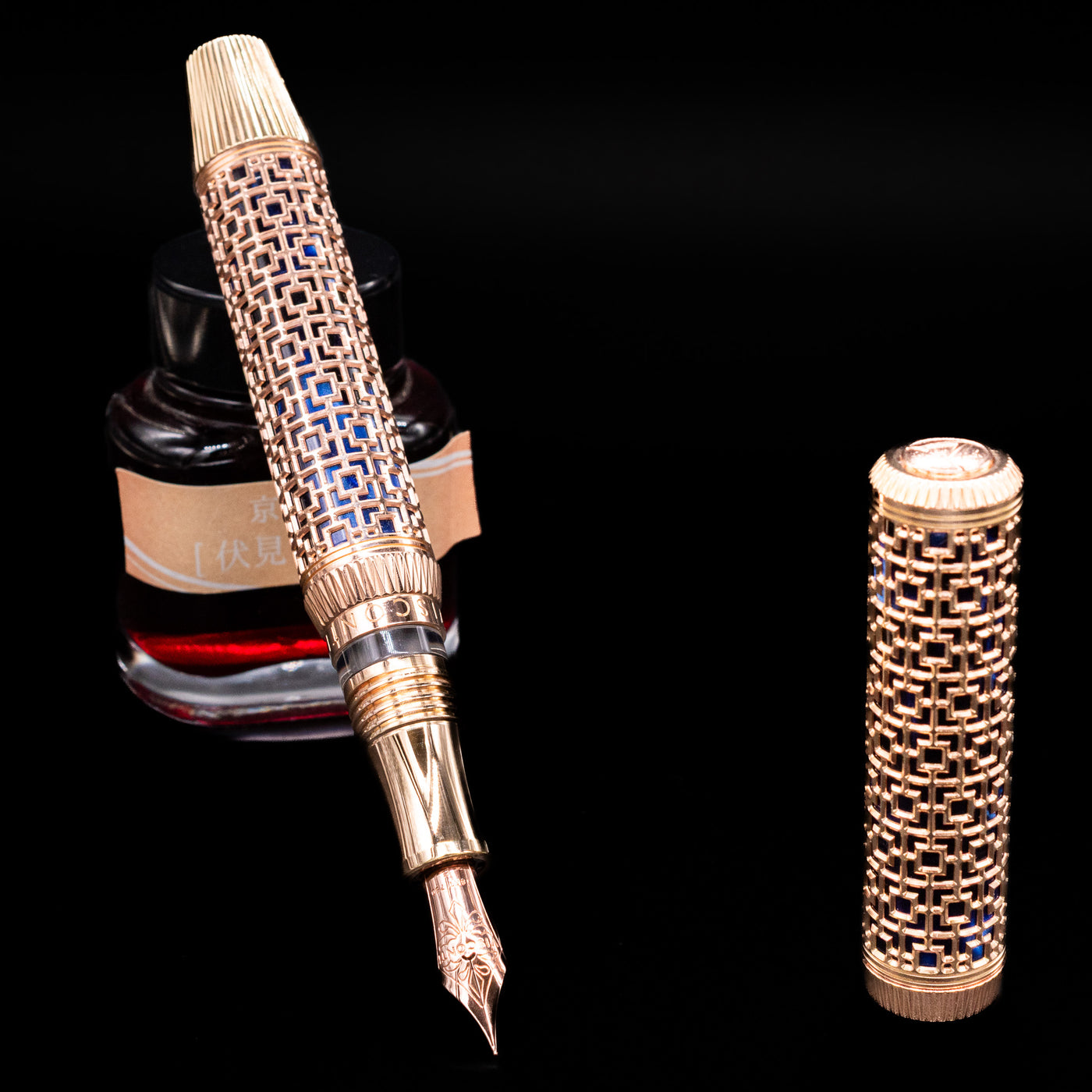 Uncapped Visconti Looking East Fountain Pen with visible 18k gold nib and detailed filigree overlay