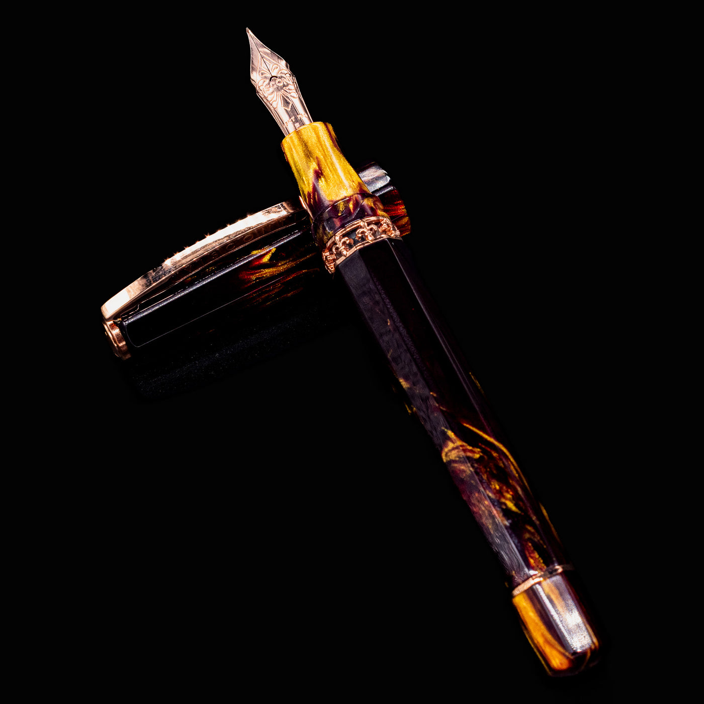 Visconti Medici Palazzo Pitti Fountain Pen displayed diagonally with cap and body showing swirling fire opal tones