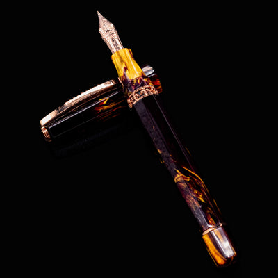 Visconti Medici Palazzo Pitti Fountain Pen displayed diagonally with cap and body showing swirling fire opal tones