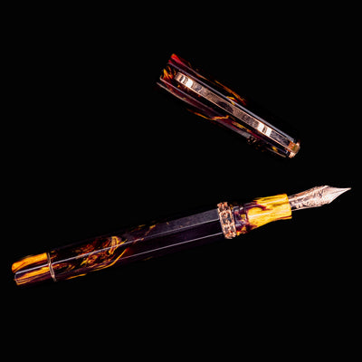 Horizontal view of Visconti Medici Palazzo Pitti Fountain Pen with cap off and 18k nib visible