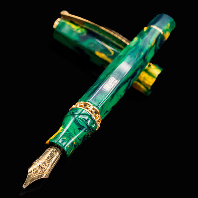 Close-up of Visconti Medici Palazzo Riccardi fountain pen nib and marbled green resin body