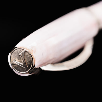 Visconti Michelangelo Venus Rose Fountain Pen cap finial with engraved Visconti “V” emblem