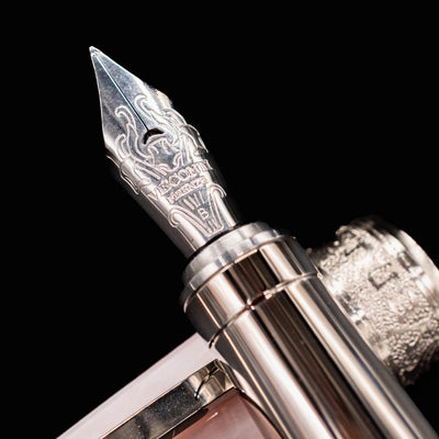 Close-up of the Visconti Michelangelo Venus Rose silver-toned fountain pen nib with intricate engraving