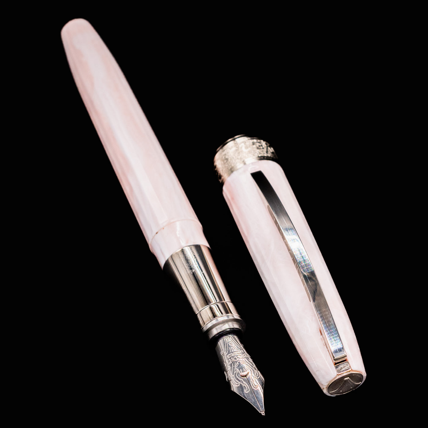 Visconti Michelangelo Venus Rose Fountain Pen displayed with cap removed, showing gleaming nib and grip