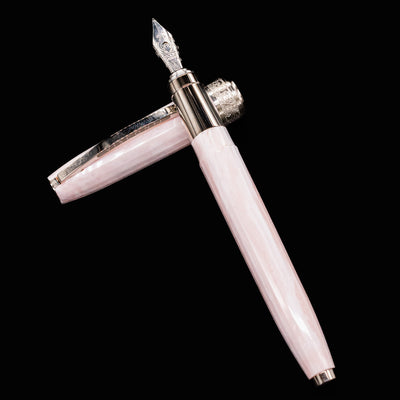 Top-down view of the Visconti Michelangelo Venus Rose Fountain Pen with nib pointed upward