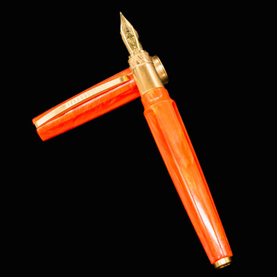Visconti Mirage Mythos Fountain Pen Demeter shown uncapped on flat background with bronze details and warm orange swirled resin