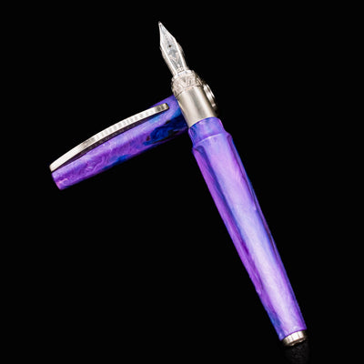 Side profile of Visconti Mirage Mythos Fountain Pen in Persephone with cap resting beside the pen