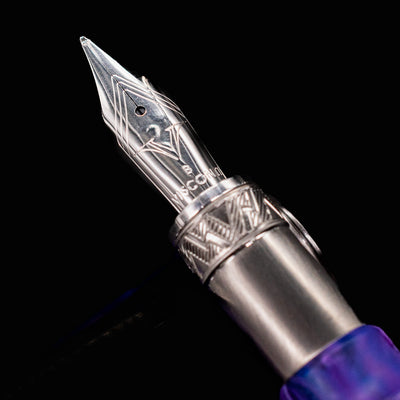 Close-up of Visconti Mirage Mythos Persephone stainless steel fountain pen nib with engraved detailing