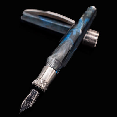 Side view of the Visconti Mirage Mythos Poseidon Fountain Pen with the cap off and nib exposed