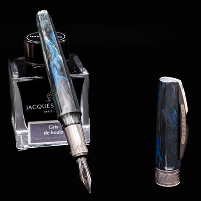 Visconti Mirage Mythos Poseidon Fountain Pen shown with Jacques Herbin Gris de Houle ink bottle