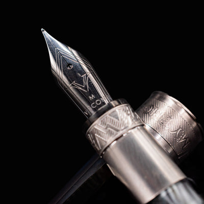 Close-up detail of the engraved nib on the Visconti Mirage Mythos Poseidon Fountain Pen