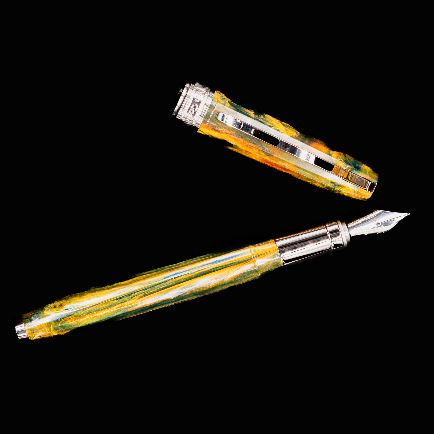 Flat lay of uncapped Visconti Van Gogh Café Terrace fountain pen showing full resin body and cap