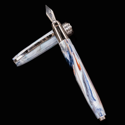 Visconti Van Gogh Old Vineyard Fountain Pen with cap removed, showcasing the nib and colorful marbled resin