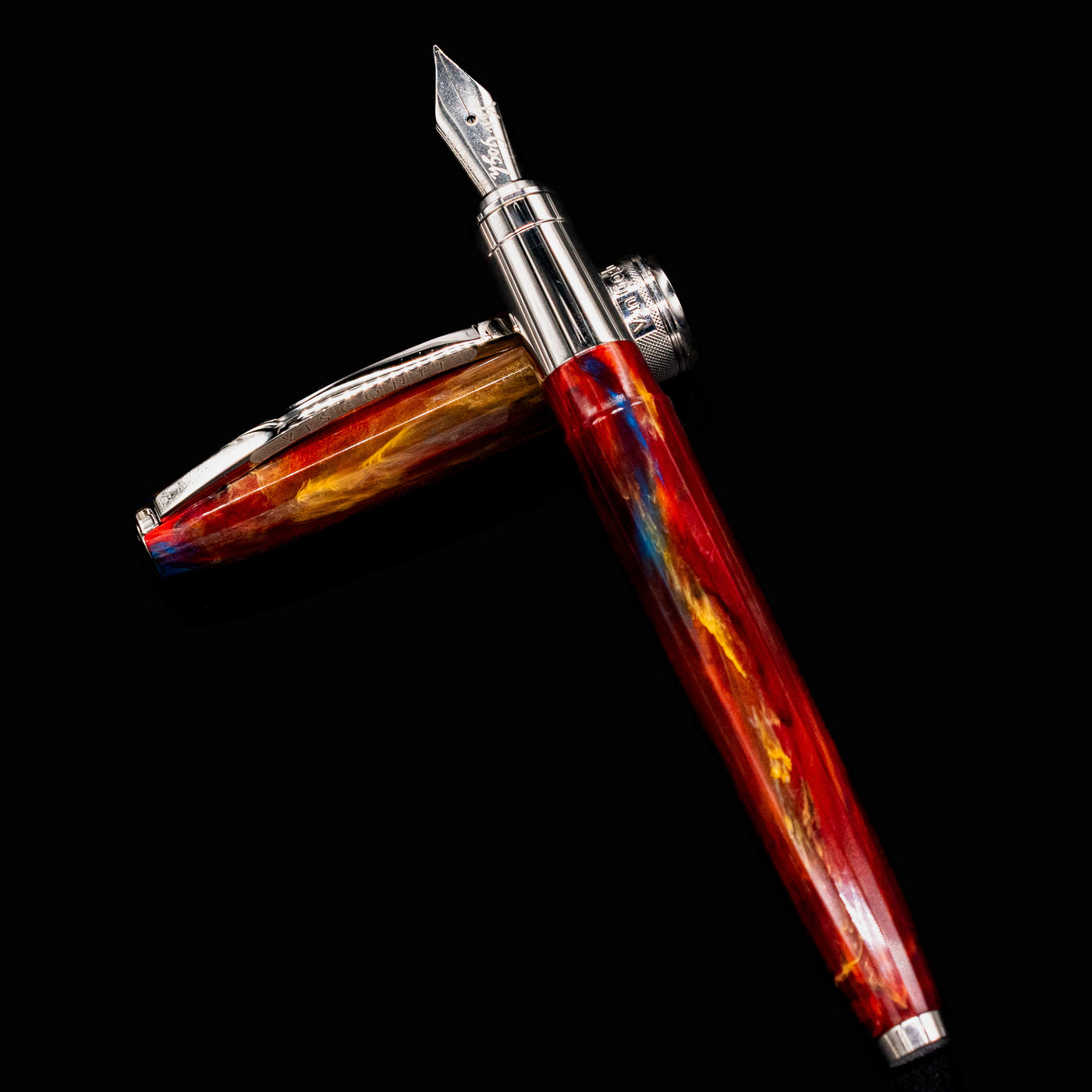 Full view of uncapped Visconti Van Gogh Red Vineyard Fountain Pen crossed with cap, showcasing colorful resin and silver accents