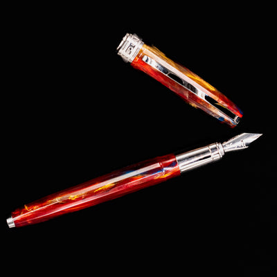 Horizontal view of Visconti Van Gogh Red Vineyard Fountain Pen with cap removed, showing shimmering red and yellow resin barrel