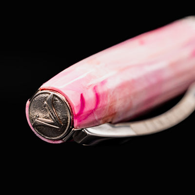 Close-up of Visconti Van Gogh Souvenir de Mauve fountain pen finial showing metal V emblem
