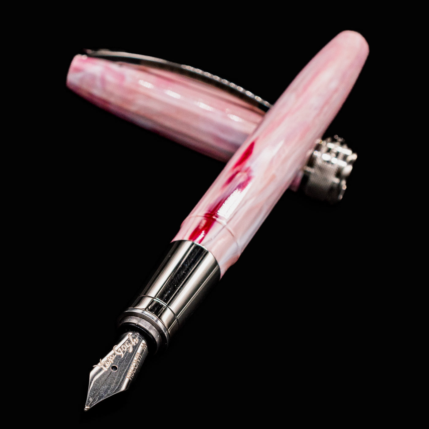Close-up of Visconti Van Gogh Souvenir de Mauve Fountain Pen nib with marbled pink resin body