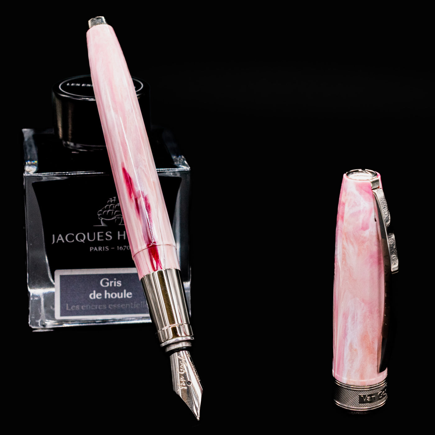 Uncapped Visconti Van Gogh Souvenir de Mauve Fountain Pen next to ink bottle showing nib and barrel