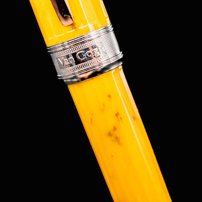 Detailed shot of Visconti Van Gogh Sunflowers Fountain Pen cap band with engraved name and texture