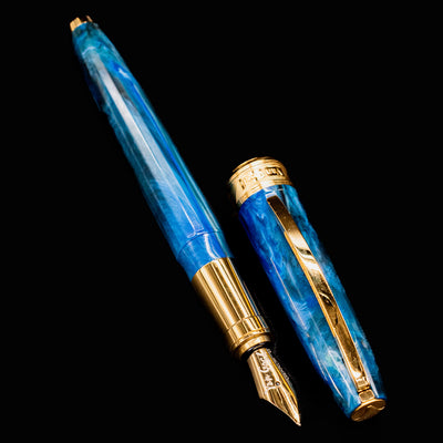 Visconti Van Gogh Wheatfield with Crows fountain pen fully uncapped showing marbled blue body and cap.