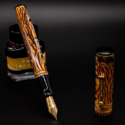 Wahl Eversharp Decoband Cracked Ice Fountain Pen displayed with yellow-labeled ink bottle
