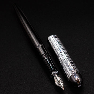 Side-by-side view of the uncapped Wahl Eversharp Skyline Fountain Pen - Black & Chrome, highlighting the barrel and cap details.