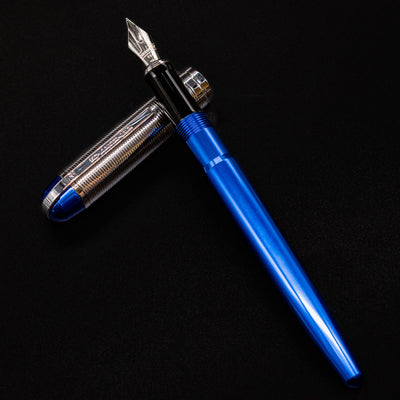 Wahl Eversharp Skyline Fountain Pen - Blue & Chrome fully displayed with cap placed beside it.