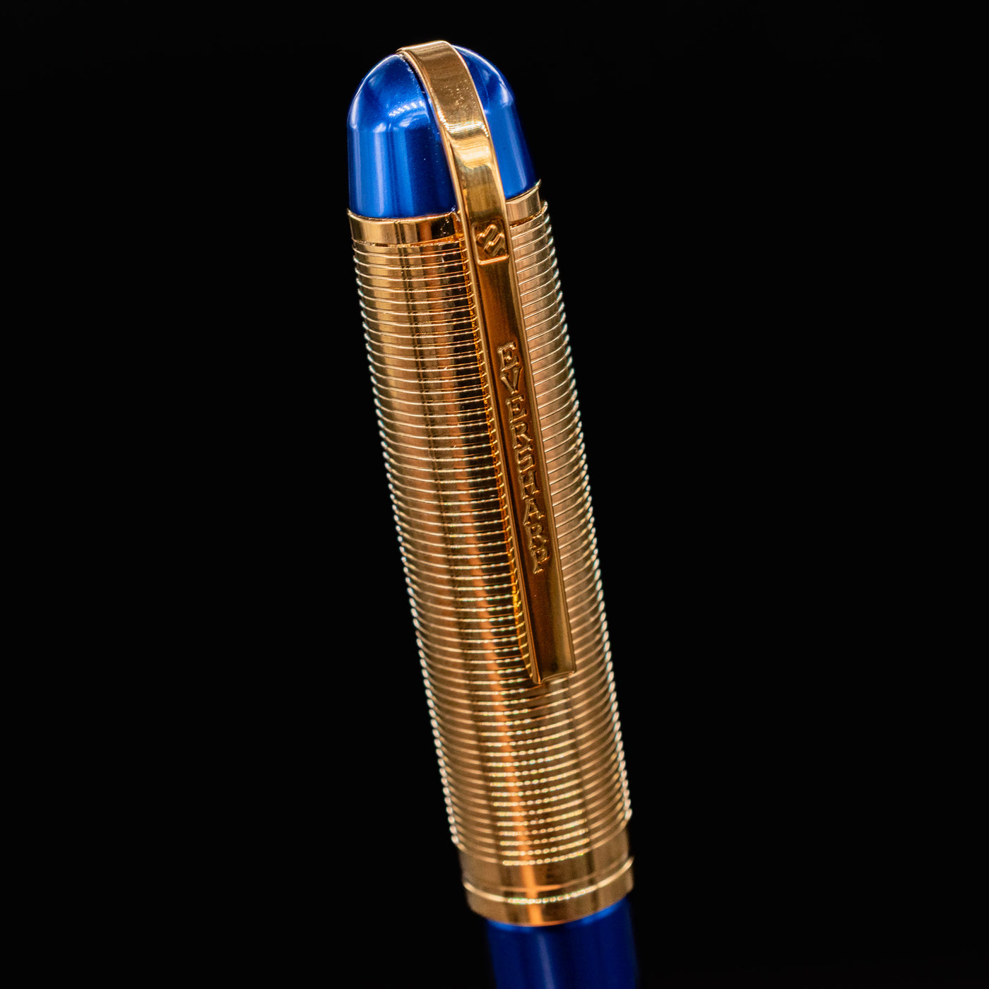 Close-up of the cap on the Wahl Eversharp Skyline Fountain Pen - Blue & Gold with detailed gold-plated lines and clip.