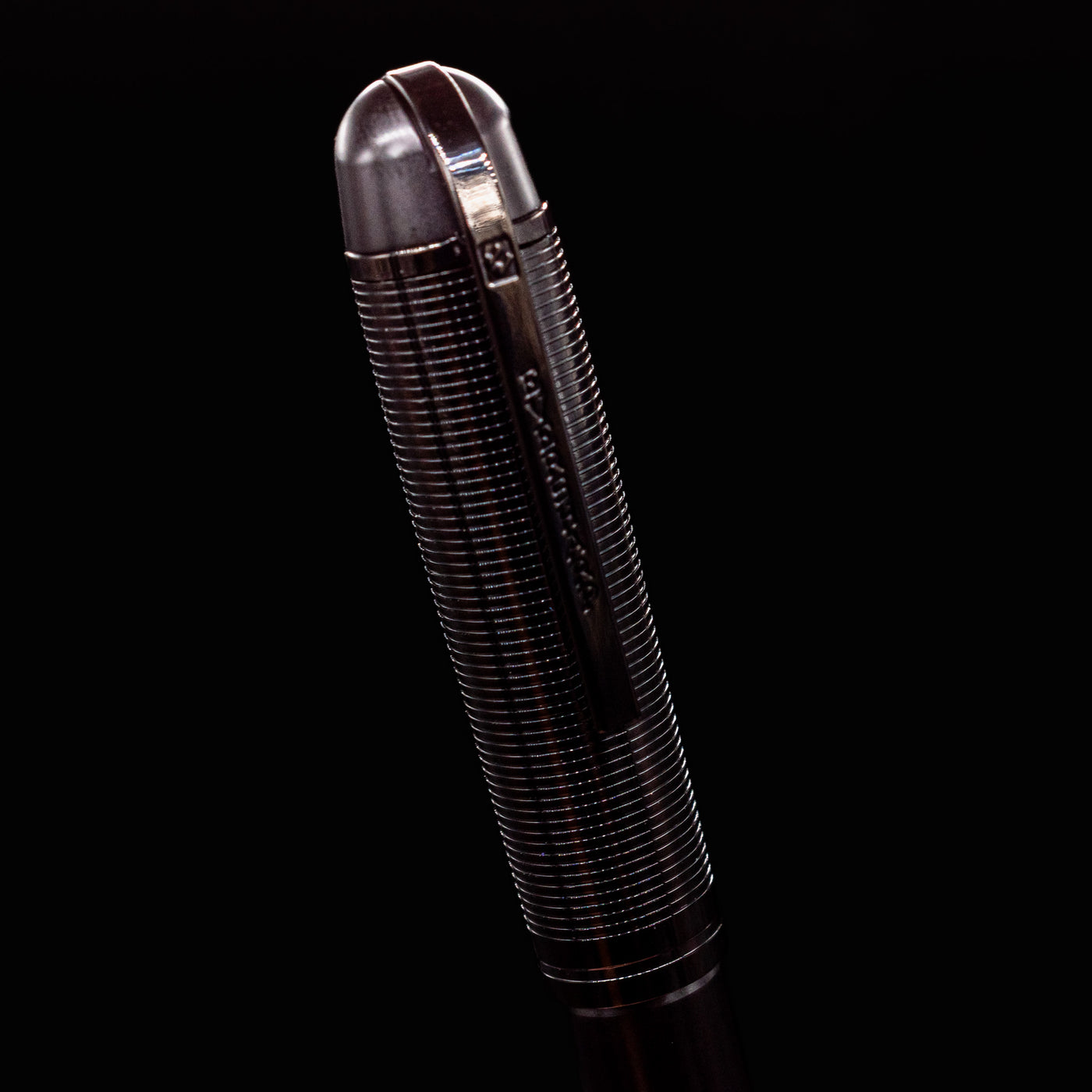 Close-up of the Wahl Eversharp Skyline Fountain Pen - Aviator Black cap with deep black metallic finish and engraved clip.
