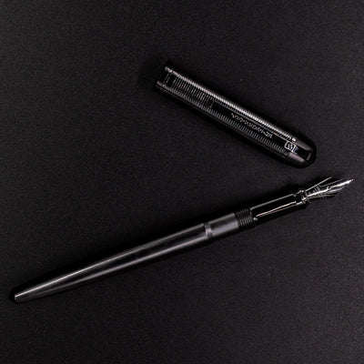 Wahl Eversharp Skyline Fountain Pen - Aviator Black uncapped and viewed from above on black background.