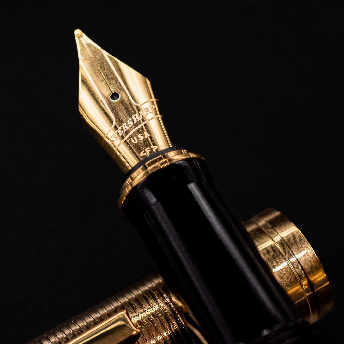 Close-up of the gold nib on the Wahl Eversharp Skyline Fountain Pen - Black & Gold showing engraved branding