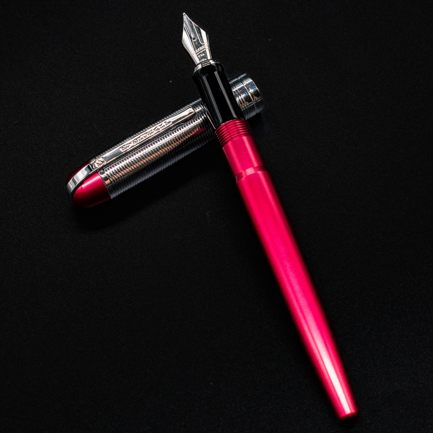 Side view of the uncapped Wahl Eversharp Skyline Fountain Pen in Red & Chrome