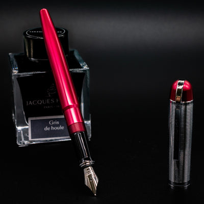 Wahl Eversharp Skyline Fountain Pen - Red & Chrome open next to Jacques Herbin Gris de Houle ink bottle