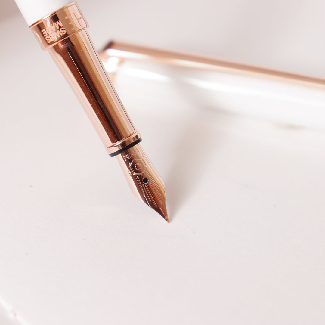 Caran D'Ache Leman Slim Fountain Pen - White & Rose Gold – Truphae