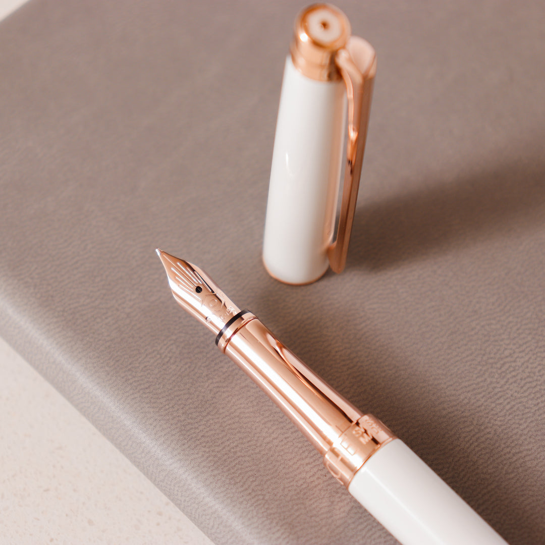 Caran D'Ache Leman Slim Fountain Pen - White & Rose Gold – Truphae