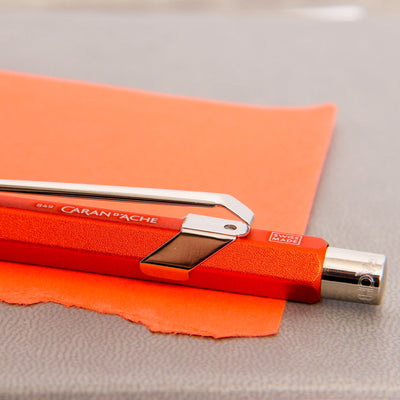Caran d'Ache 849 Colormat X Orange Ballpoint Pen Silver Clip